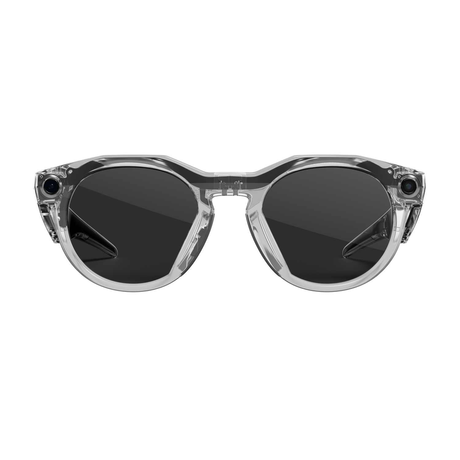 Gafas inteligentes transparentes con lentes oscuras y cámaras a cada lado. La montura es transparente y el fondo gris.
