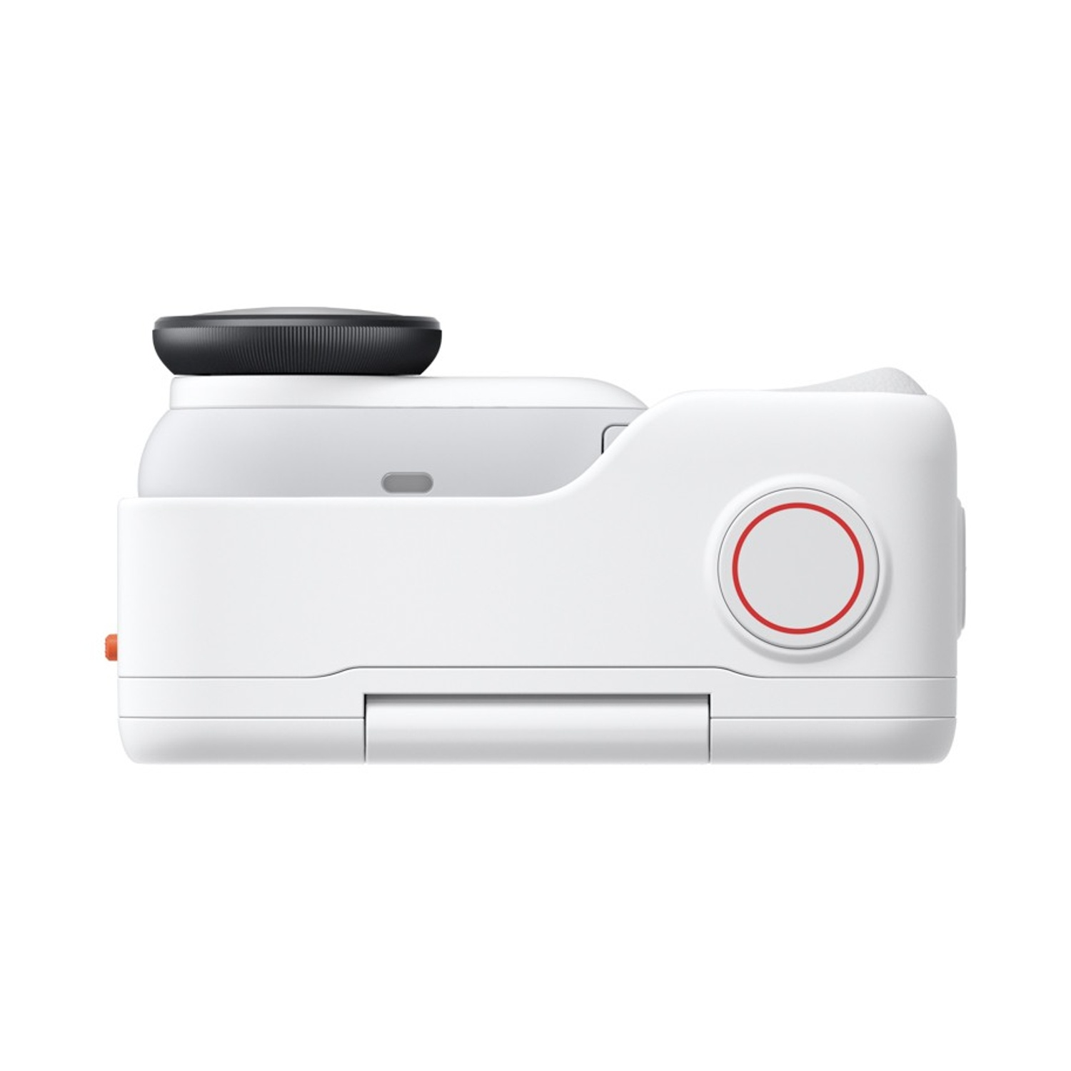 Fotocamera bianca in un supporto bianco. La fotocamera ha un top nero. Il supporto ha un cerchio rosso e un pulsante arancione.