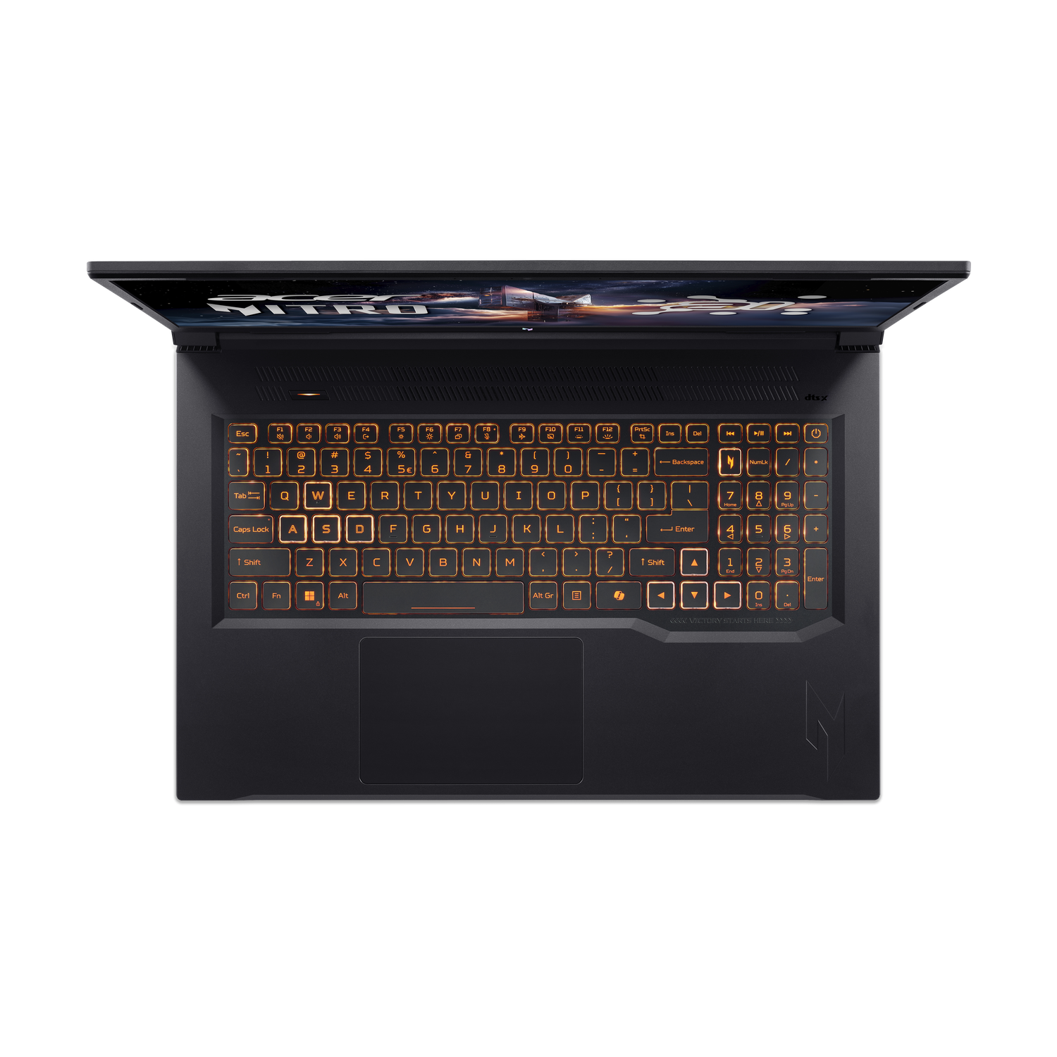 A black laptop is open, showing the keyboard with orange backlit keys. The screen displays a bright graphic.