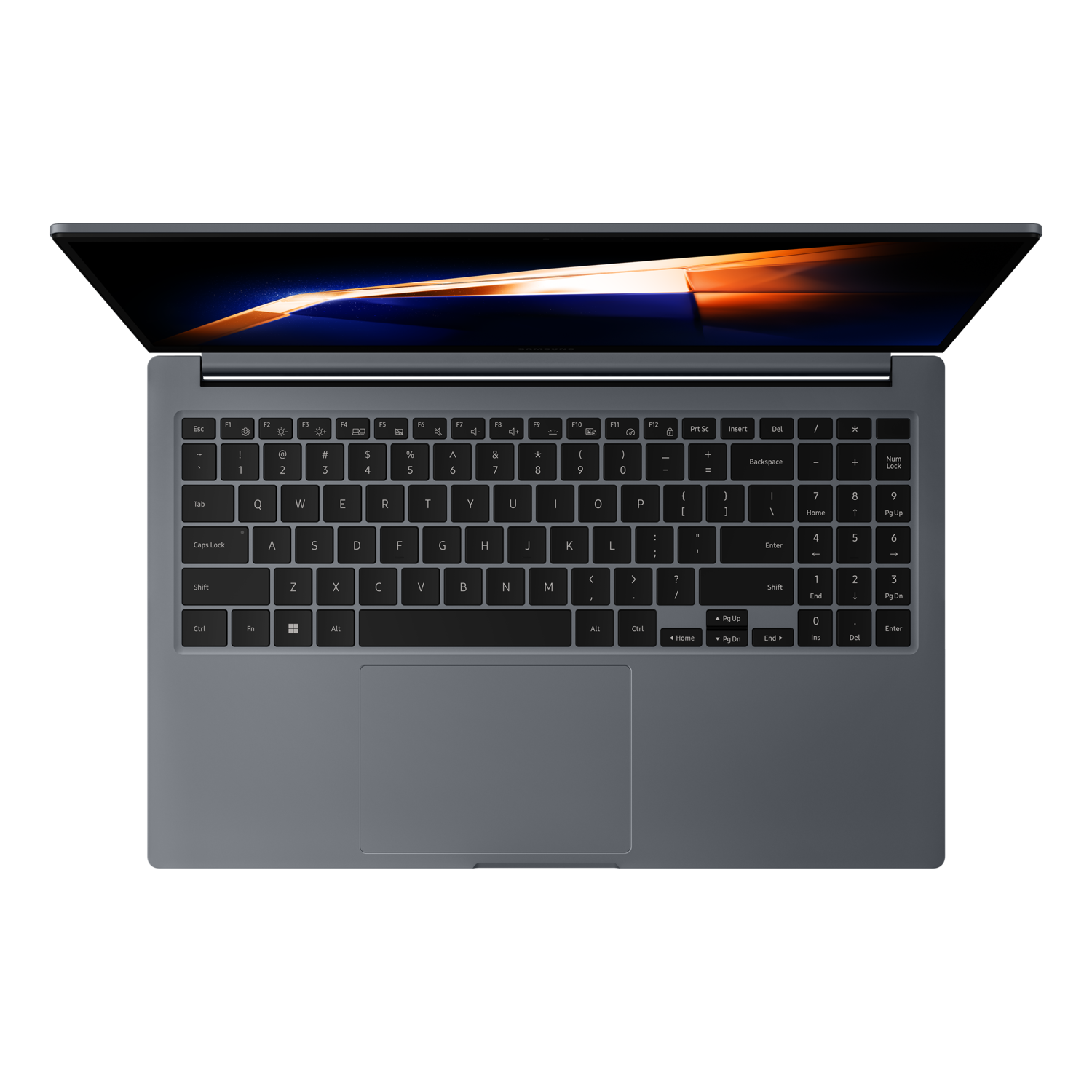 Top-down view of a grey laptop with the screen open. The keyboard and touchpad are visible, set against a black background.