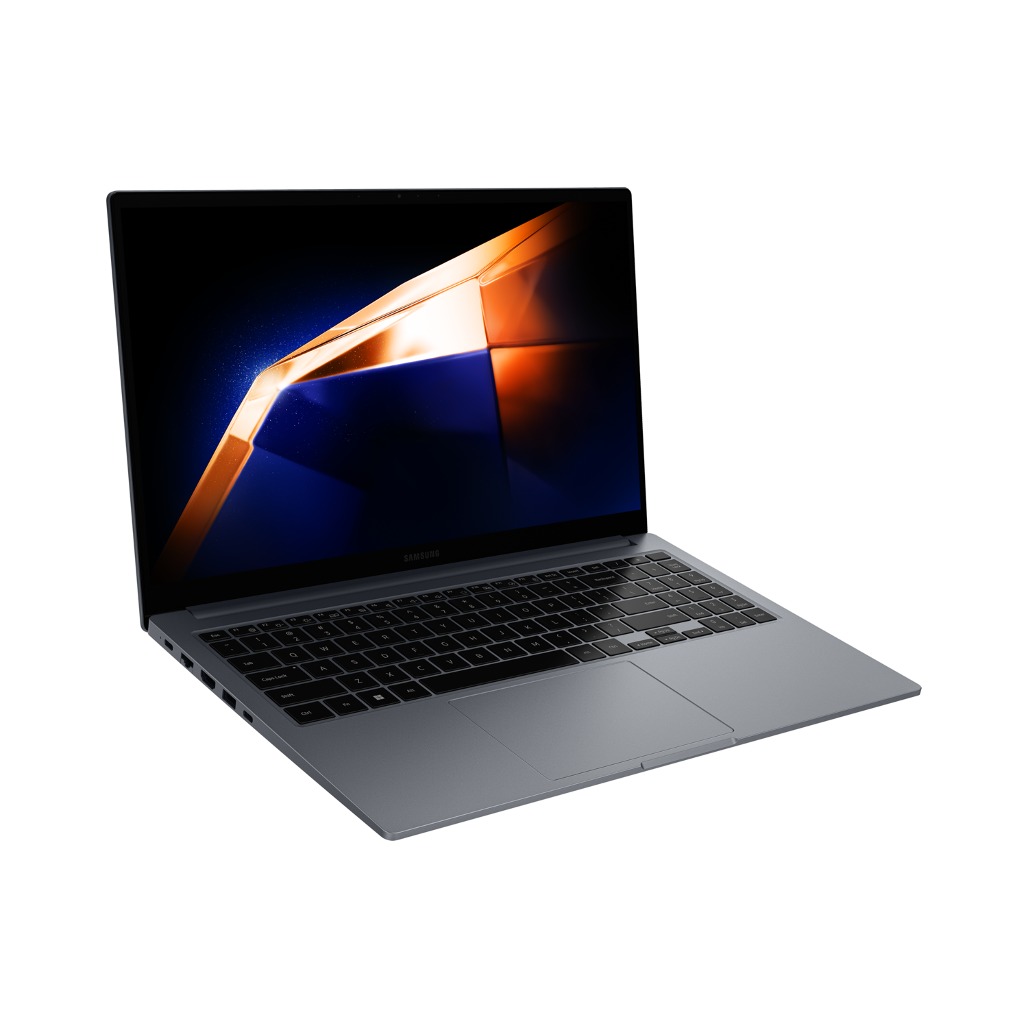 A gray Samsung laptop is open on a black surface. The screen displays an abstract orange and blue design. The keyboard is visible.