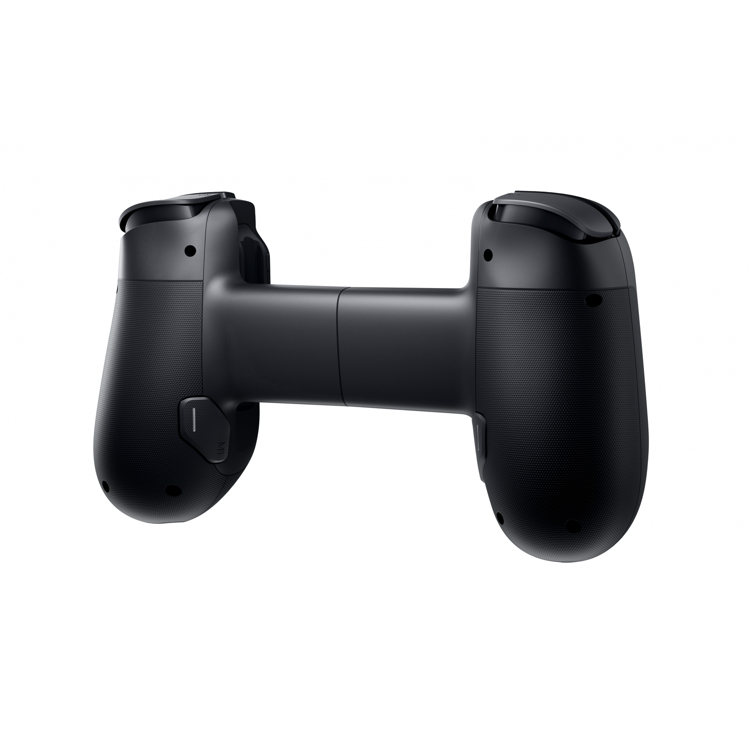 A black gamepad with textured grips is centered against a white background. It's designed to be held with two hands.