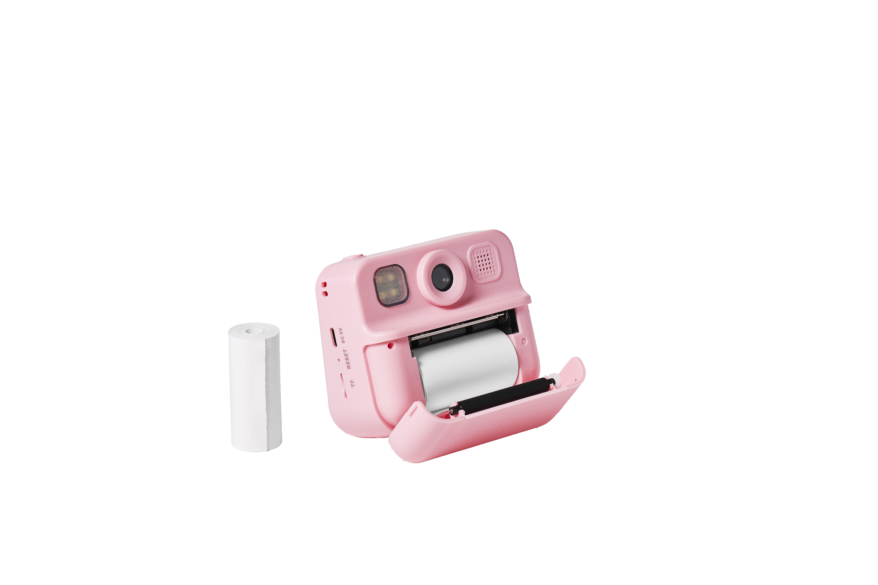 Siyah arka plan üzerinde açık kağıt bölmeli pembe anında fotoğraf makinesi ve beyaz kağıt rulosu.