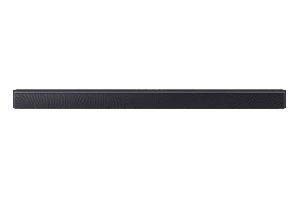 Koyu gri bir soundbar, siyah bir arka plan üzerinde ortalanmıştır. Dokulu bir ön yüzeye ve pürüzsüz bir üst yüzeye sahiptir.