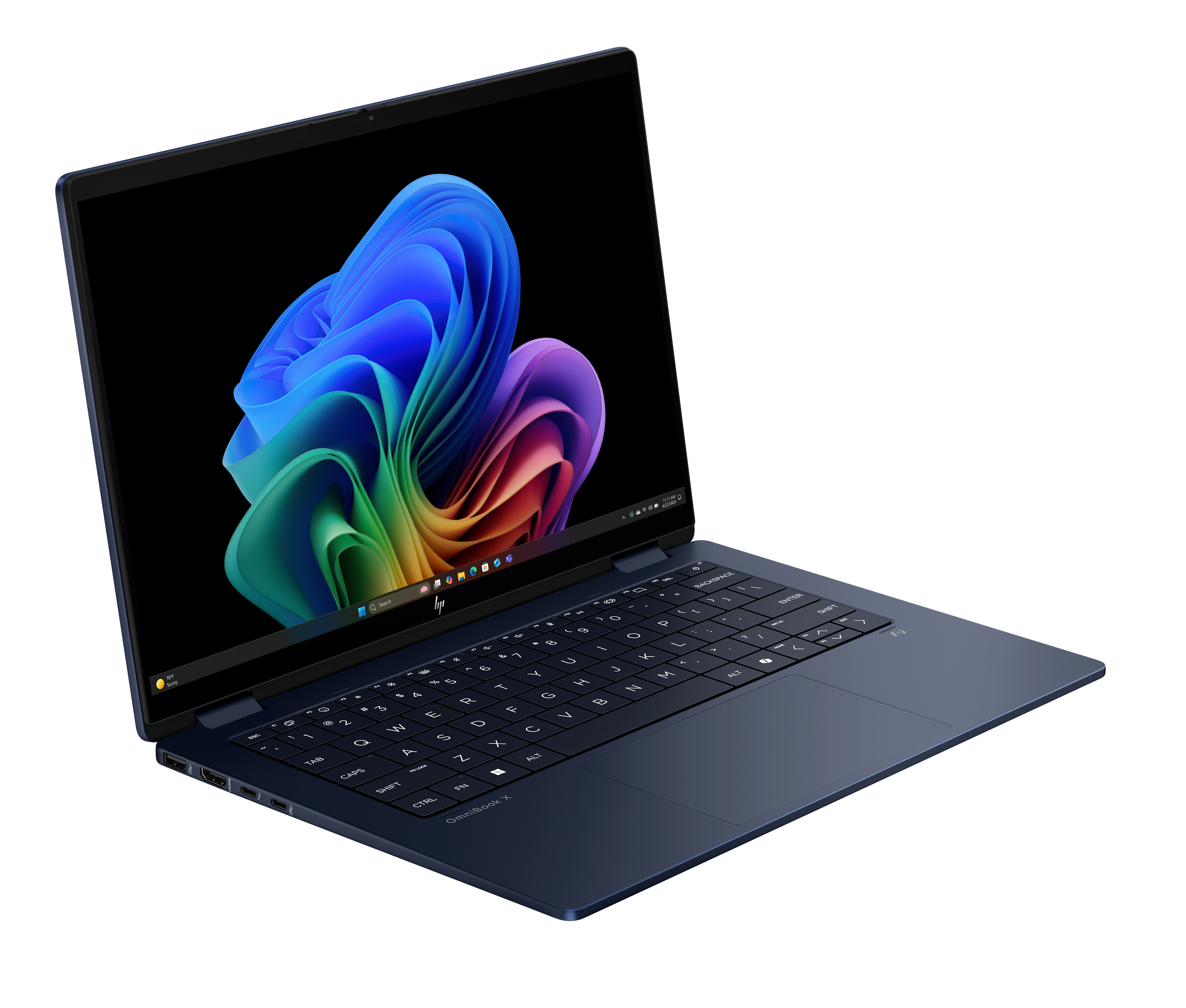 Niebieski laptop jest otwarty, wyświetlając kolorowy wir na ekranie. Tło jest czarne. Laptop leży na czarnej powierzchni.