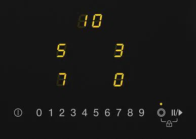 Sarı dijital rakamlarla siyah panel: 10, 5, 3, 7, 0. Aşağıda 0-9 sayıları ve simgeler.