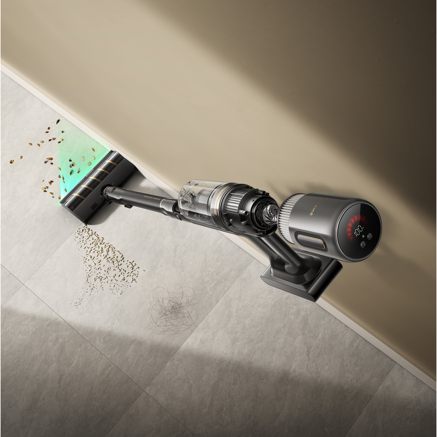 A black and silver cordless vacuum cleaner cleaning a light gray tiled floor. Debris and hair are visible on the floor.