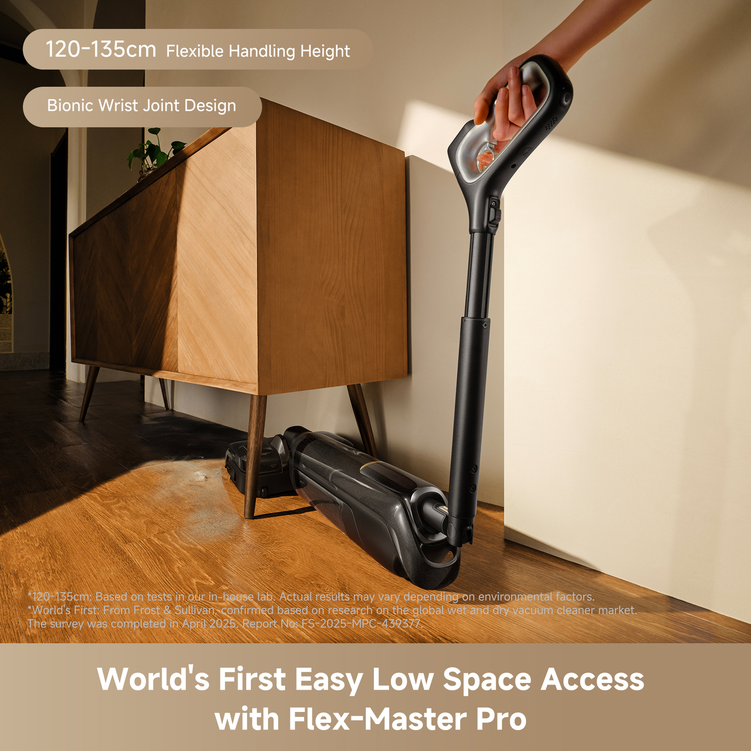 A person holds a black and gray vacuum cleaner. The text displays 'World's First Easy Low Space Access with Flex-Master Pro'.