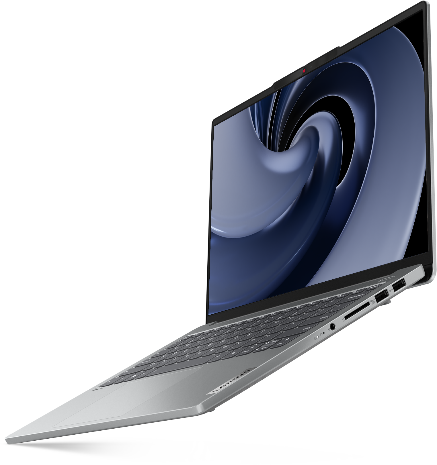Egy ezüst laptop nyitva, kék örvénymintát mutat a képernyőn. A laptop fekete háttér előtt van.