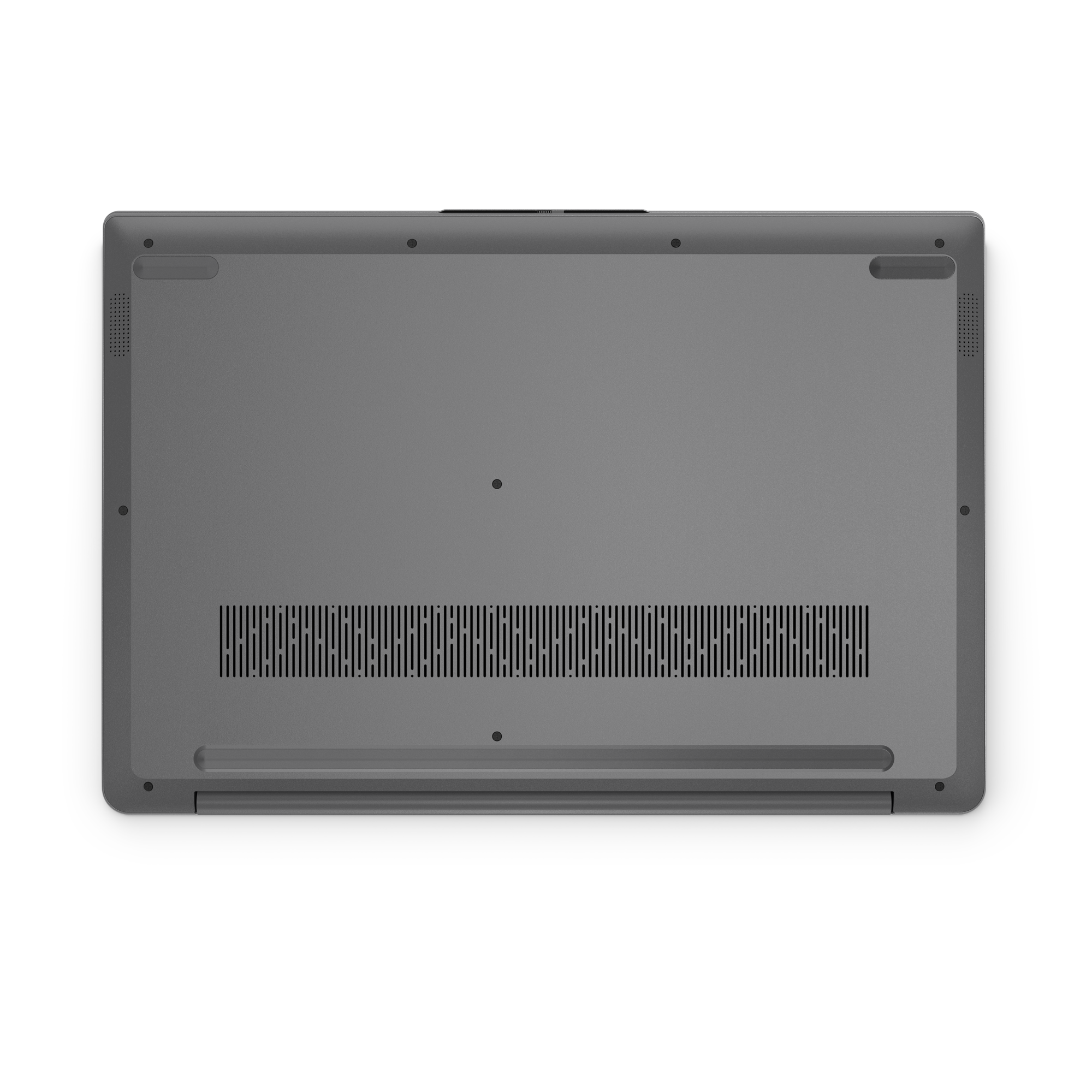 Die Unterseite eines grauen Laptops vor schwarzem Hintergrund. Es hat mehrere Lüftungsöffnungen und Schraubenlöcher.