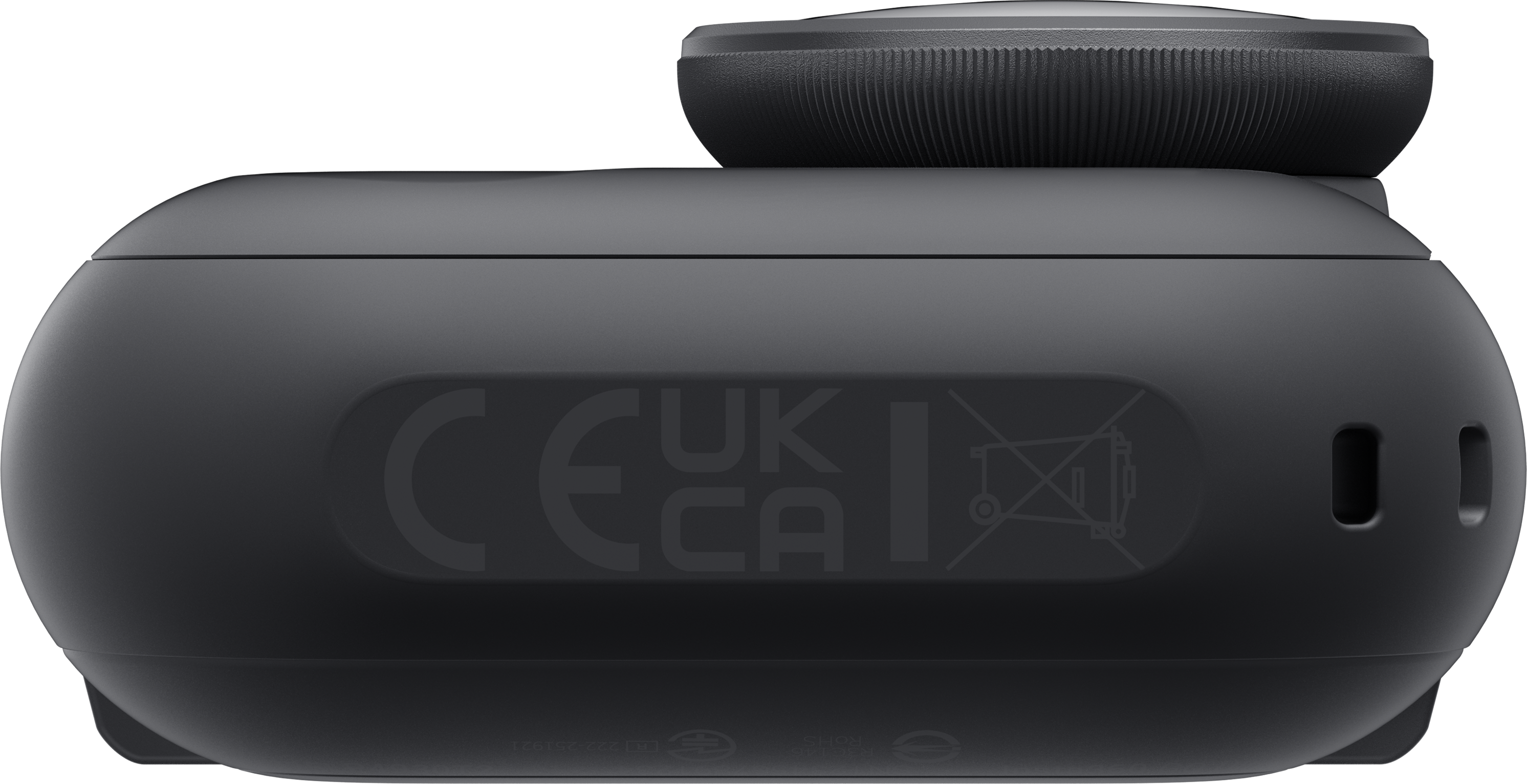 Ein schwarzes elektronisches Gerät mit Linse und Markierungen. Es hat die Symbole CE, UK CA. Der Hintergrund ist schwarz.