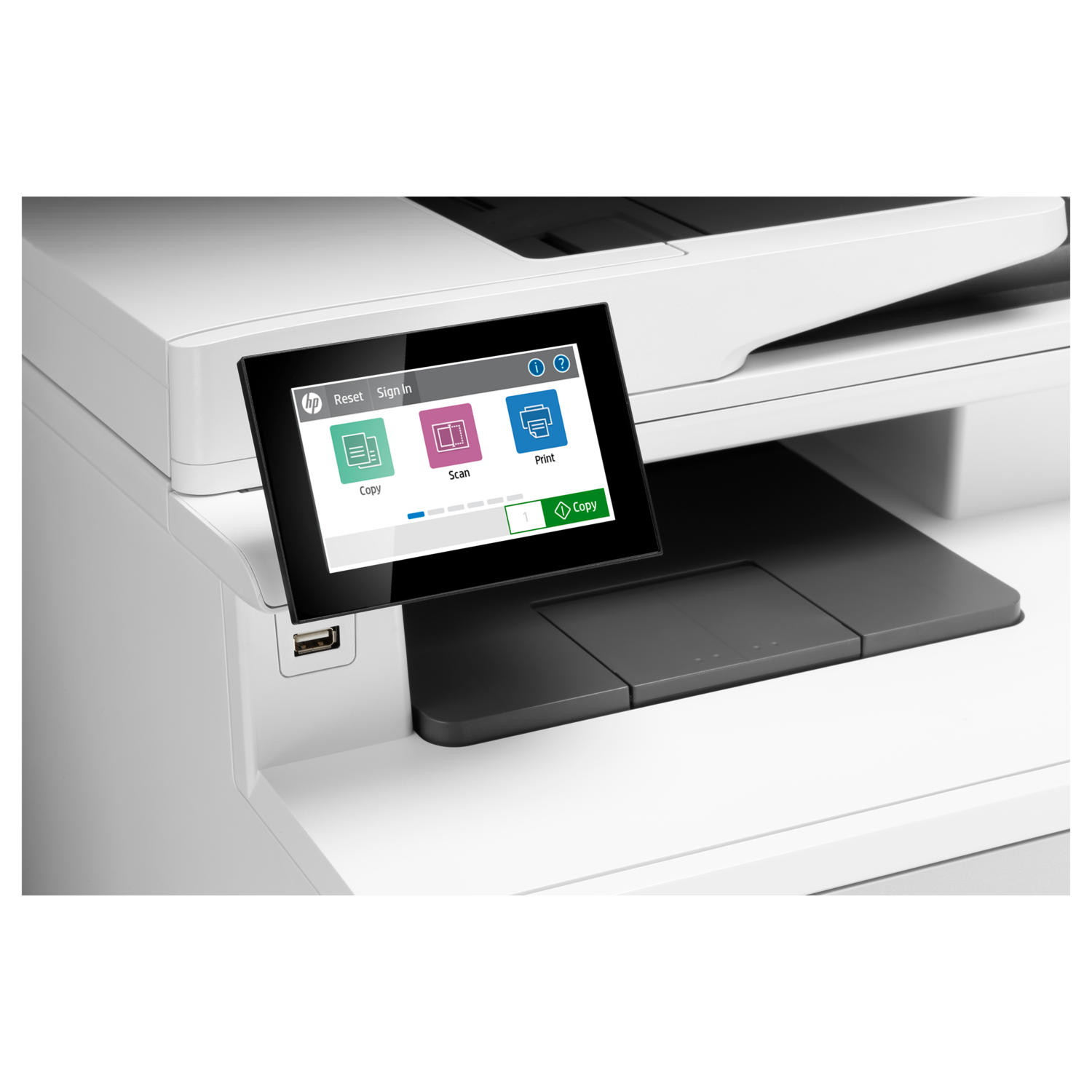 A white HP printer with a touchscreen. The screen displays 'Copy', 'Scan', and 'Print' options. A USB port is visible.