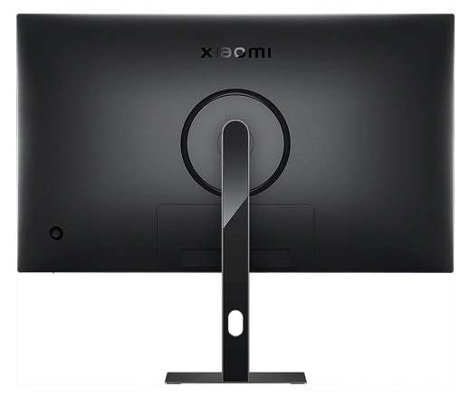 Tył czarnego monitora Xiaomi. Ma podstawkę, okrągły obszar montażowy i nazwę marki.
