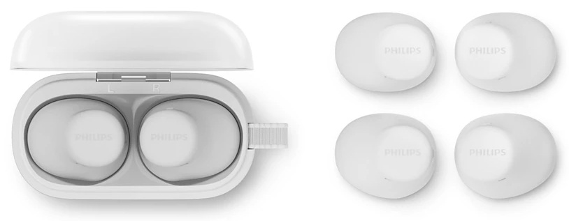 Białe słuchawki douszne Philips i etui ładujące. Pokazano również cztery dodatkowe słuchawki douszne. Etui jest otwarte.