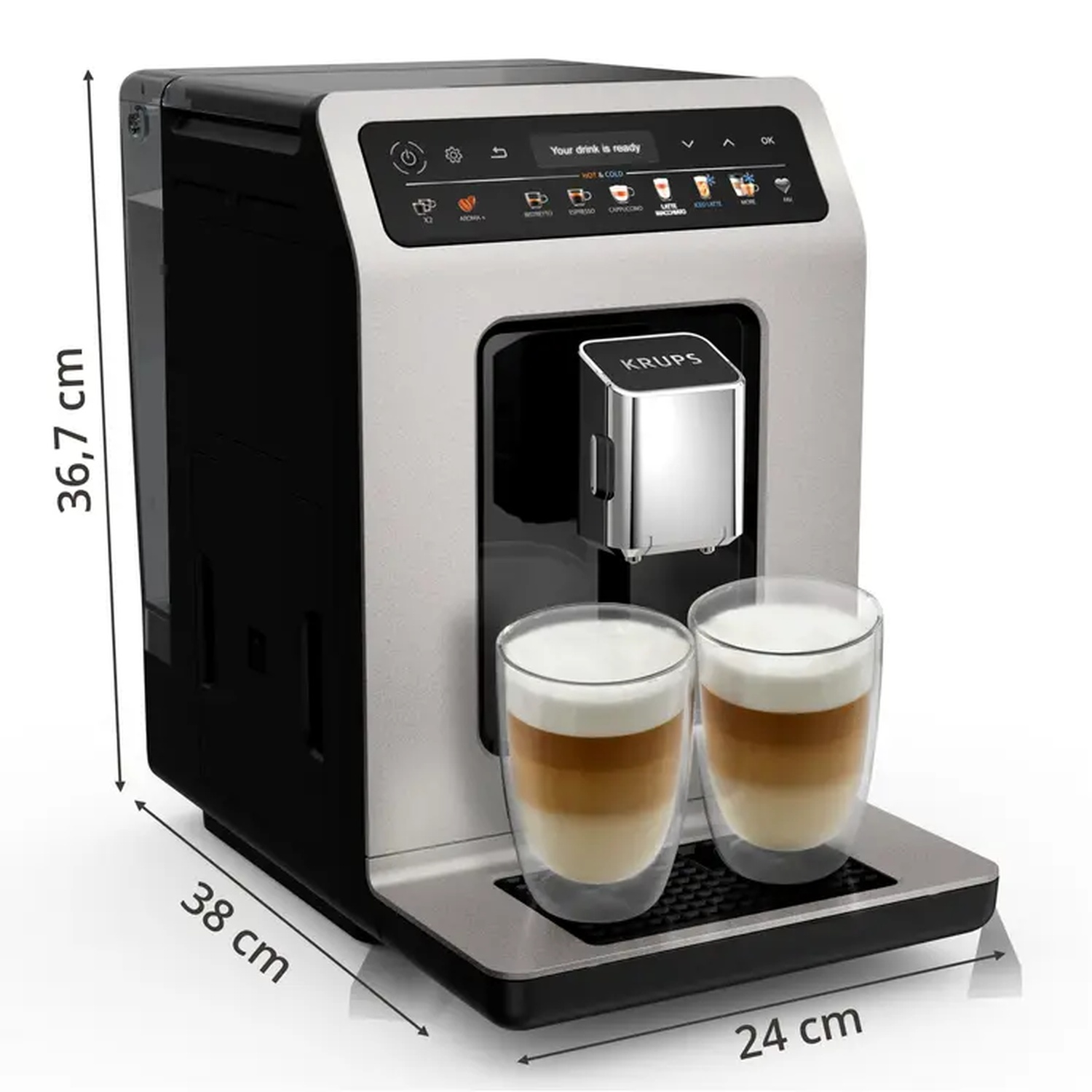 Une machine à café Krups avec deux verres de latte macchiato sur un plateau. La machine est noire et argentée avec les dimensions indiquées.