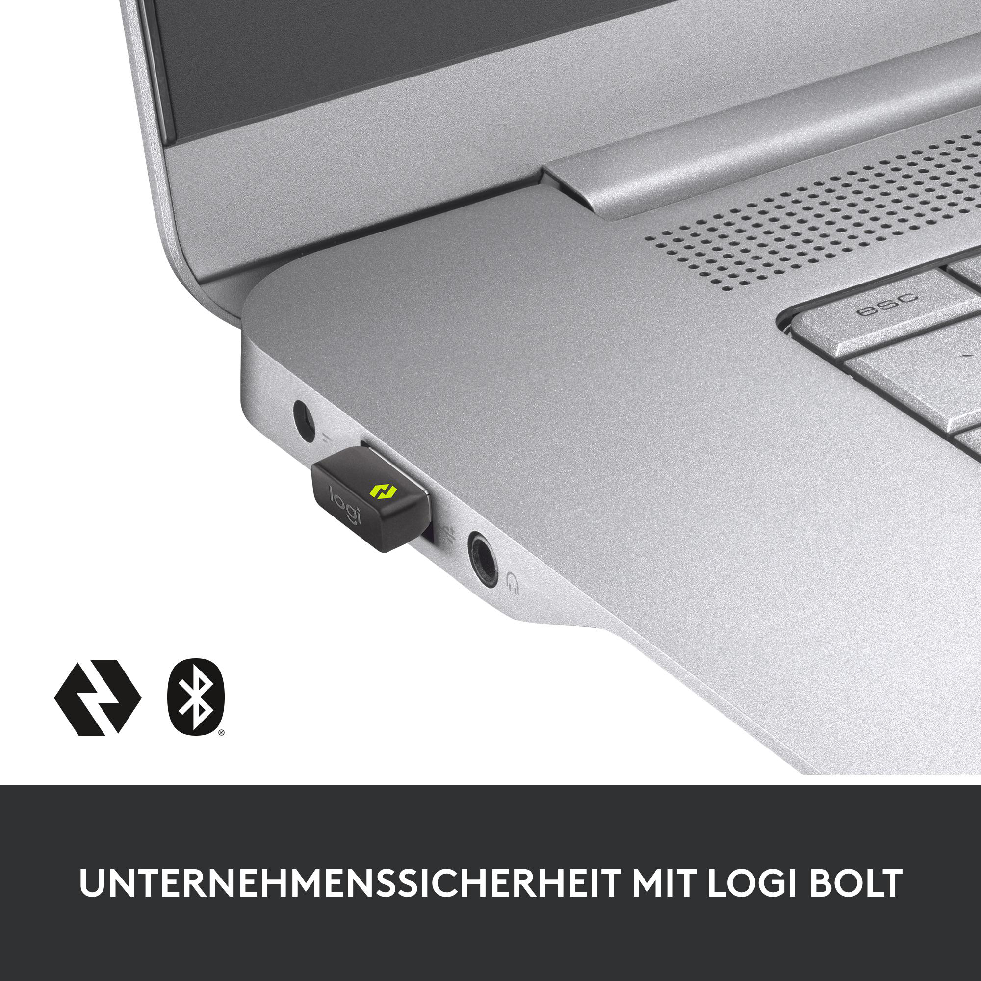 Ein silberner Laptop mit einem eingesteckten USB-Empfänger. Der Empfänger hat das Logi-Logo. Der Boden hat Text auf Deutsch.
