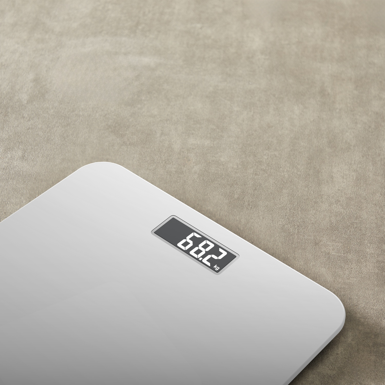 A white digital scale displays '68.2 kg'. The scale sits on a beige textured surface.