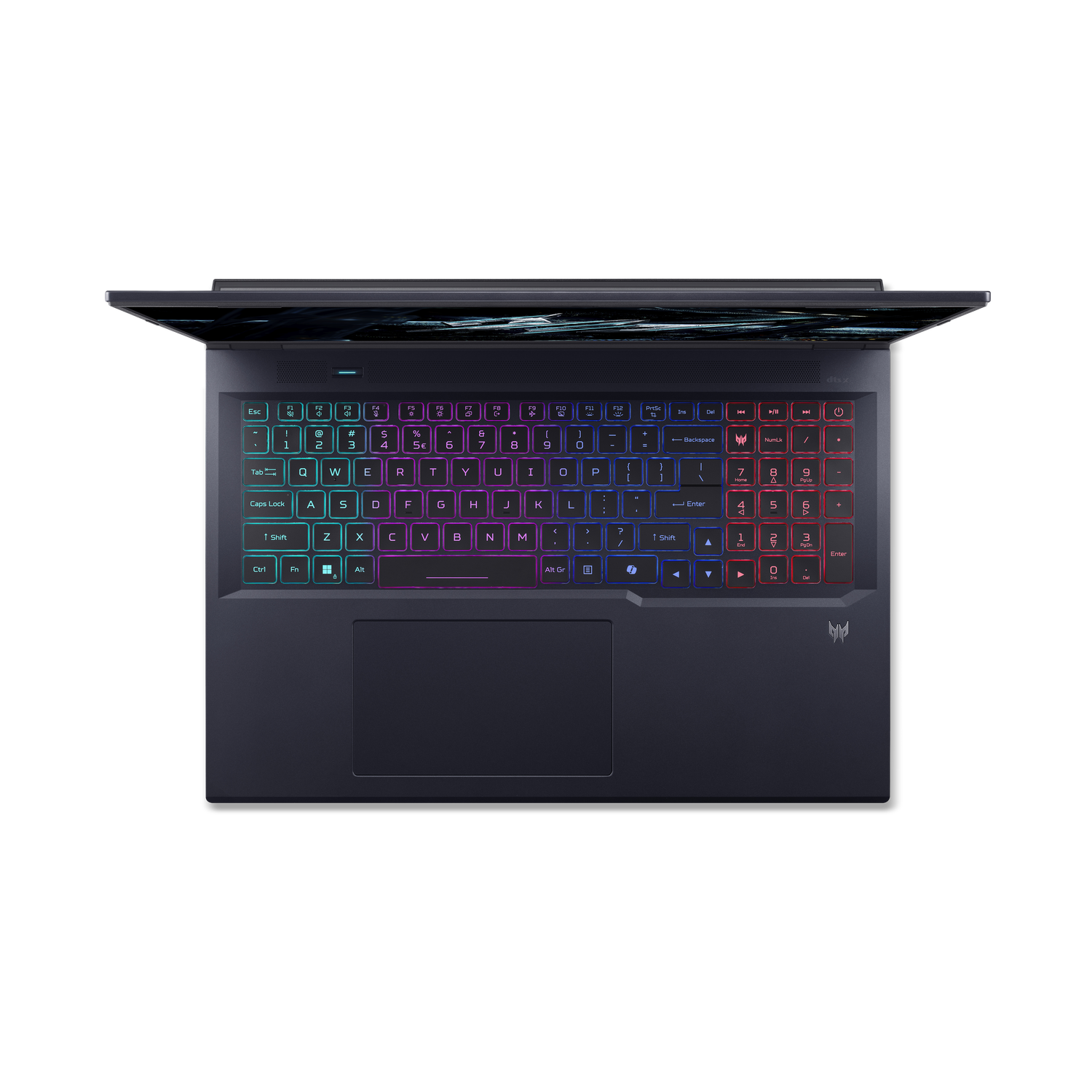 A top-down view of a dark laptop with a colorful backlit keyboard. The screen is open, showing a blurry background.