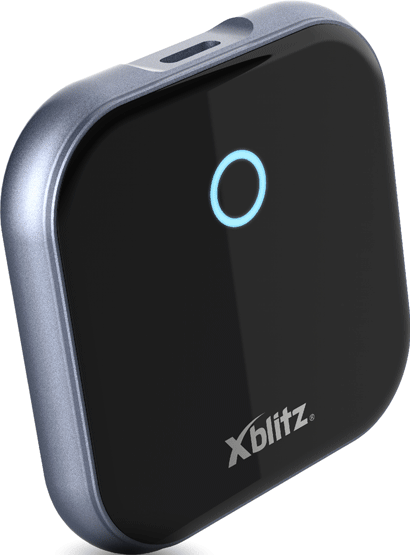 Un appareil Xblitz noir avec un bord bleu et un cercle bleu brillant. L'appareil est légèrement incliné.