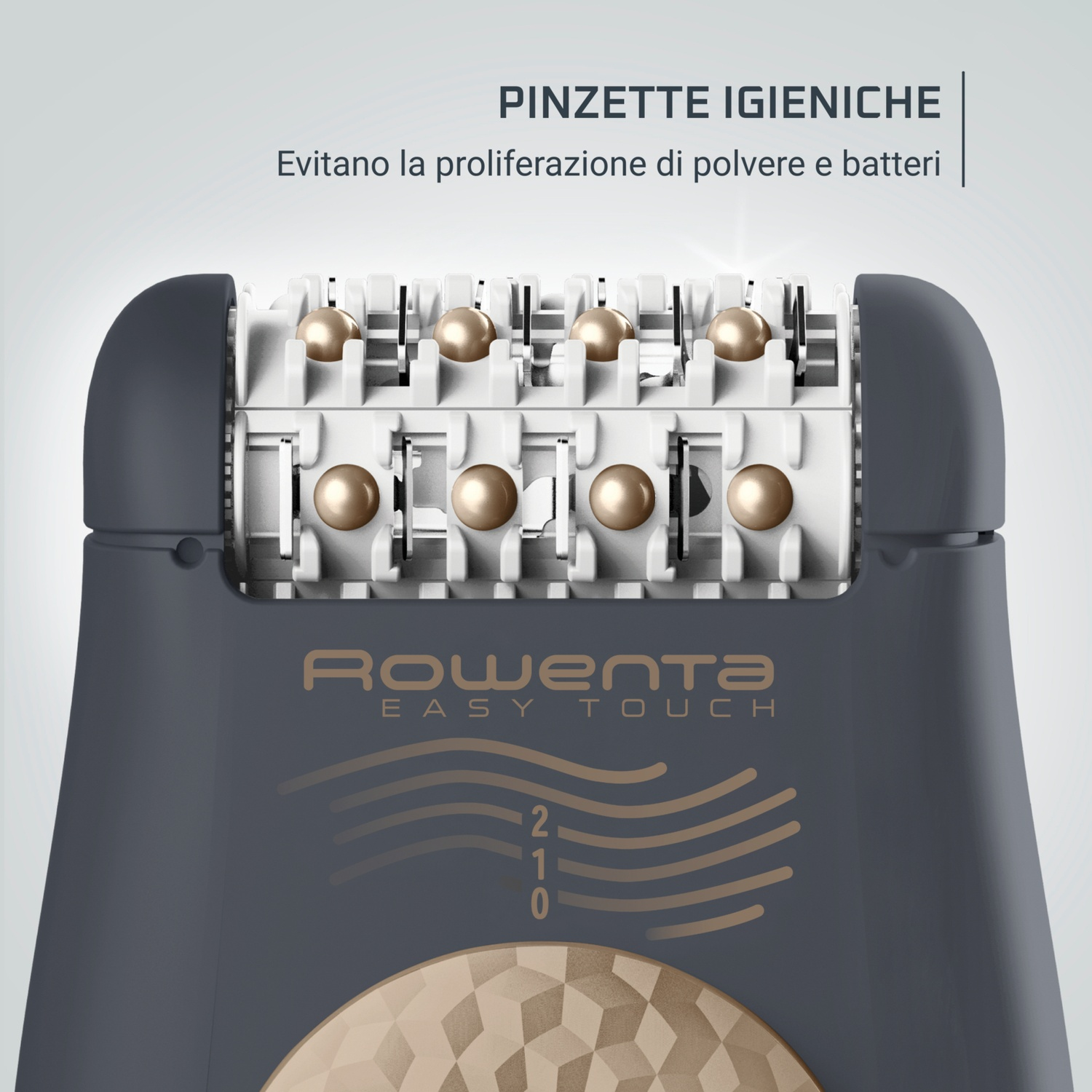 Primo piano di una testina di epilatore grigia e oro, con pinzette dorate. Il marchio Rowenta è visibile. Il testo recita 'PINZETTE IGIENICHE'.