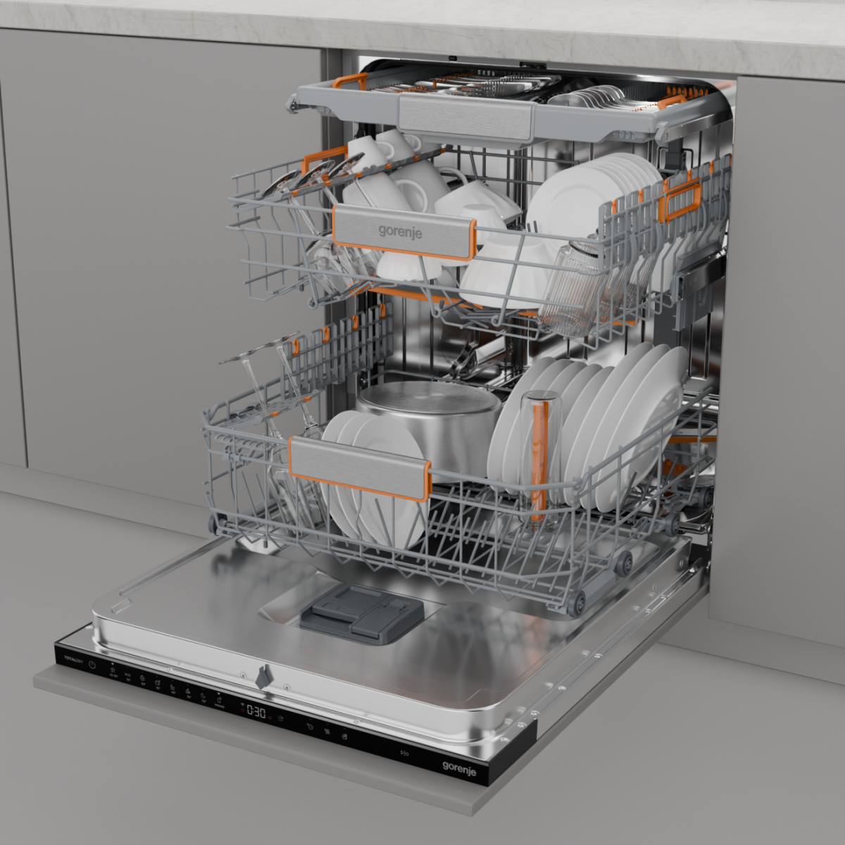 Zmywarka otwarta, załadowana naczyniami, filiżankami i garnkiem. Wnętrze z dwoma koszami. Wyświetlacz cyfrowy pokazuje 0:30. Marka Gorenje.