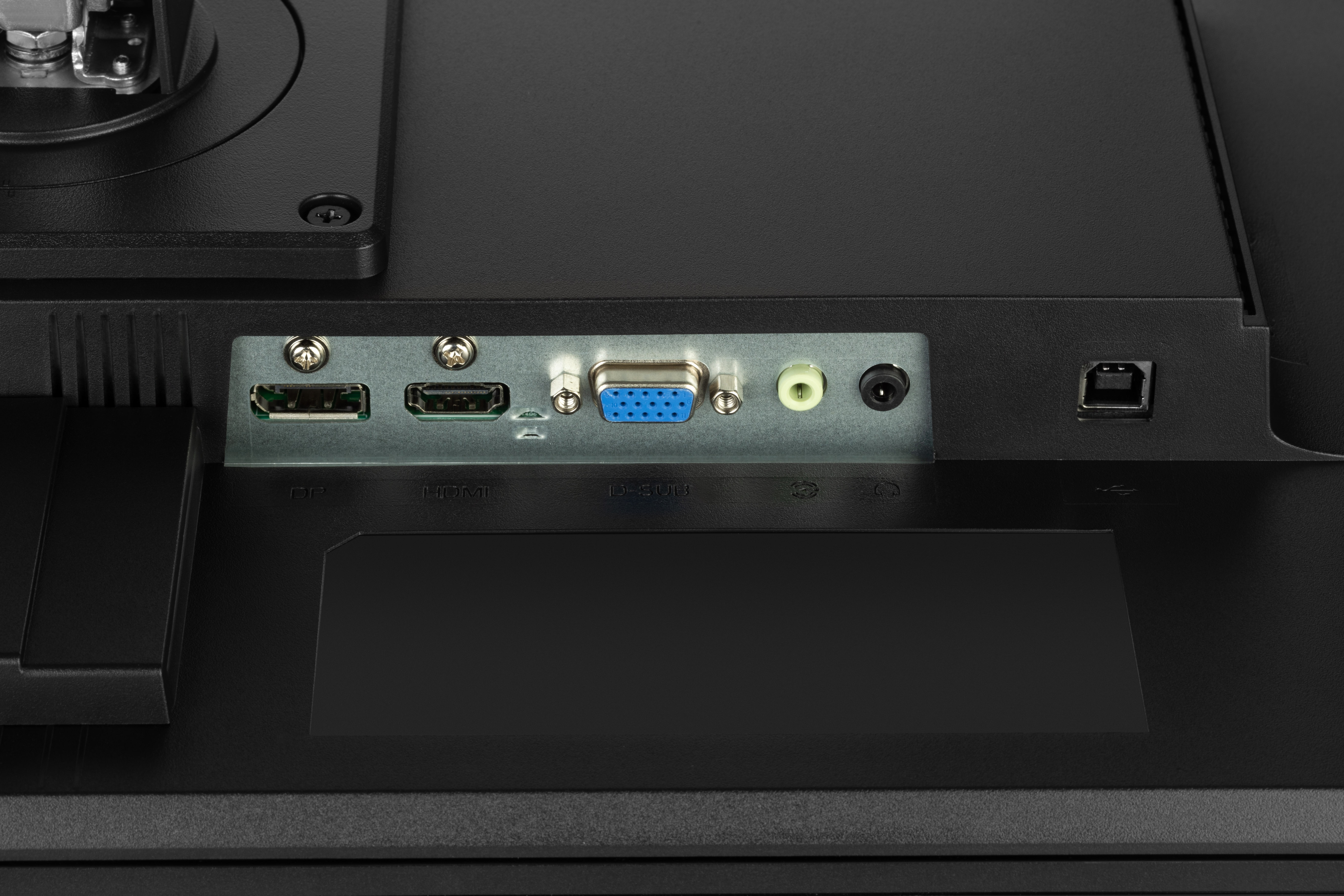 Nahaufnahme der Rückseite eines Monitors mit verschiedenen Anschlüssen: USB, HDMI, D-SUB, Audio und Strom. Überwiegend schwarz.