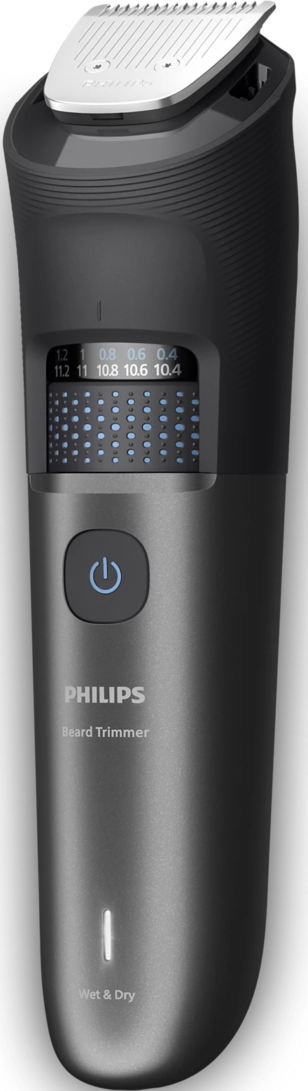 Un regolabarba Philips. È nero e grigio con impostazioni e un pulsante di accensione.