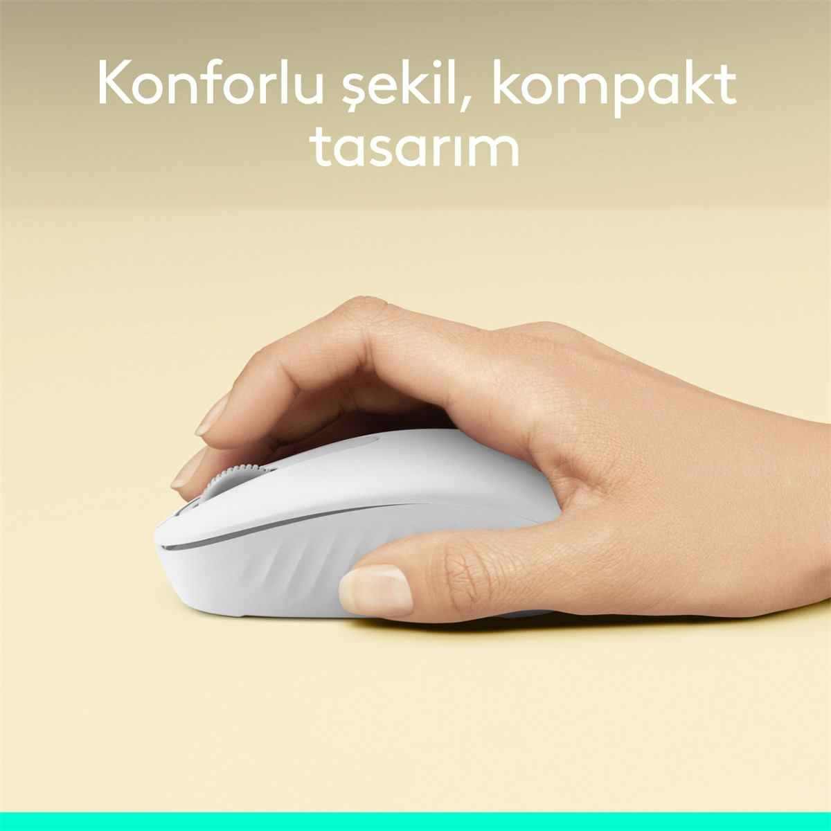 Bir el beyaz bir bilgisayar faresini tutuyor. Arka plan, 'Konforlu şekil, kompakt tasarım' metniyle açık sarı.