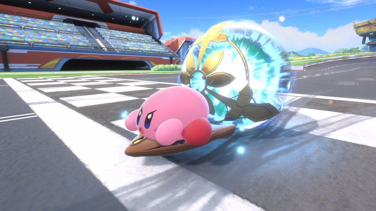 Kirby on a brown surfboard, racing near a large energy shield. A stadium and blue sky are in the background.