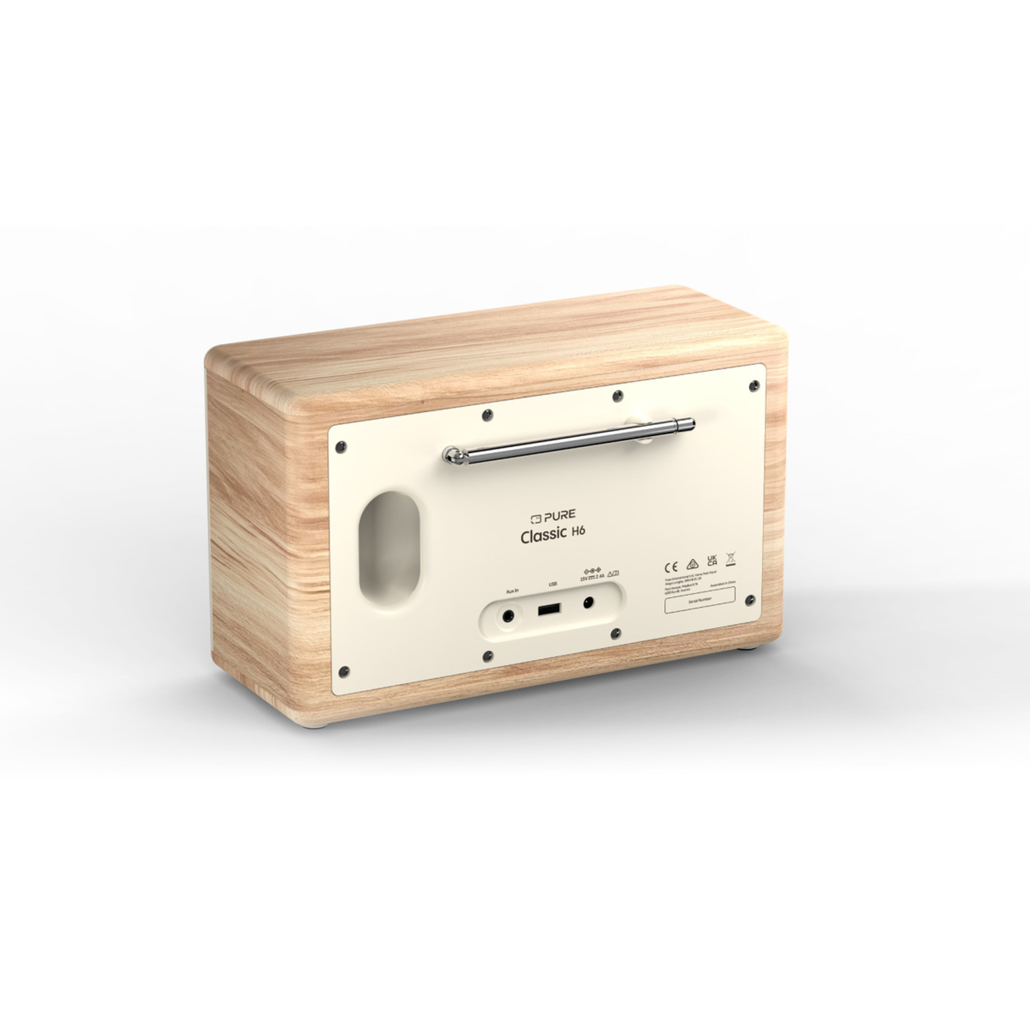Ein Holzradio mit cremefarbener Rückwand. Es hat eine ausziehbare Antenne, Knöpfe und einen Bildschirm. Die Marke ist Pure Classic H6.