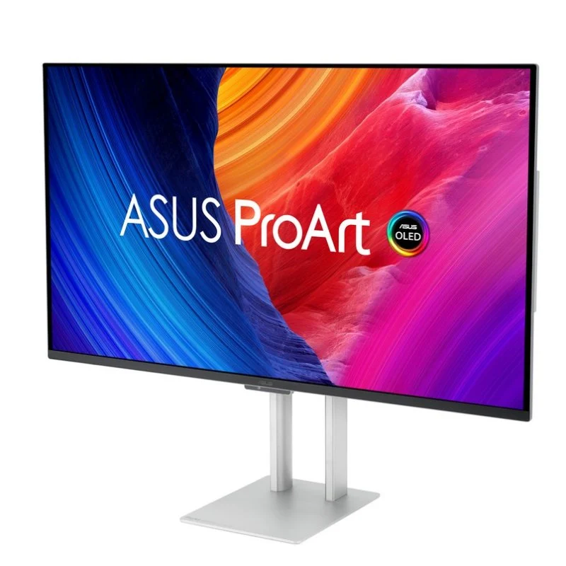 Un monitor ASUS ProArt OLED plateado. La pantalla muestra una imagen abstracta colorida. Está sobre un soporte plateado.