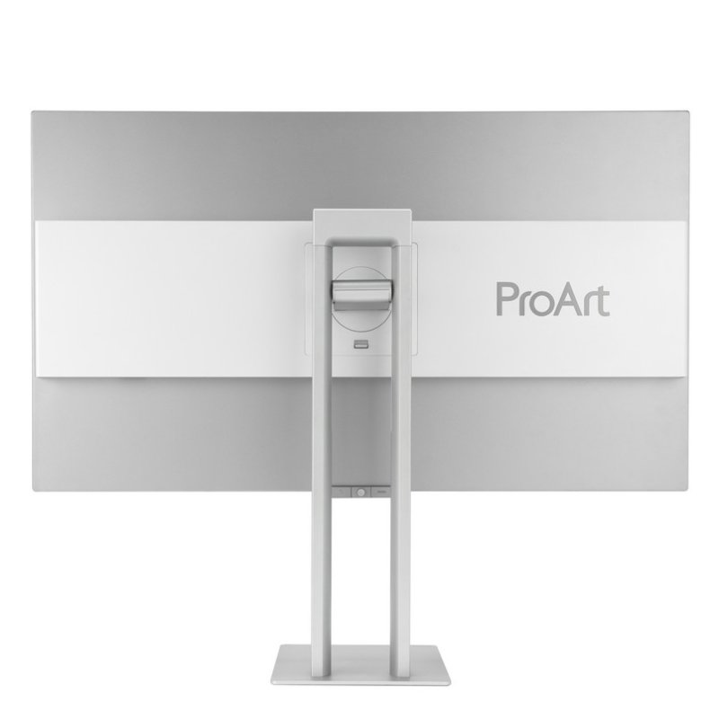 Parte trasera de un monitor. Colores plateado y blanco. Logotipo de ProArt en la sección blanca. Soporte en la parte inferior.