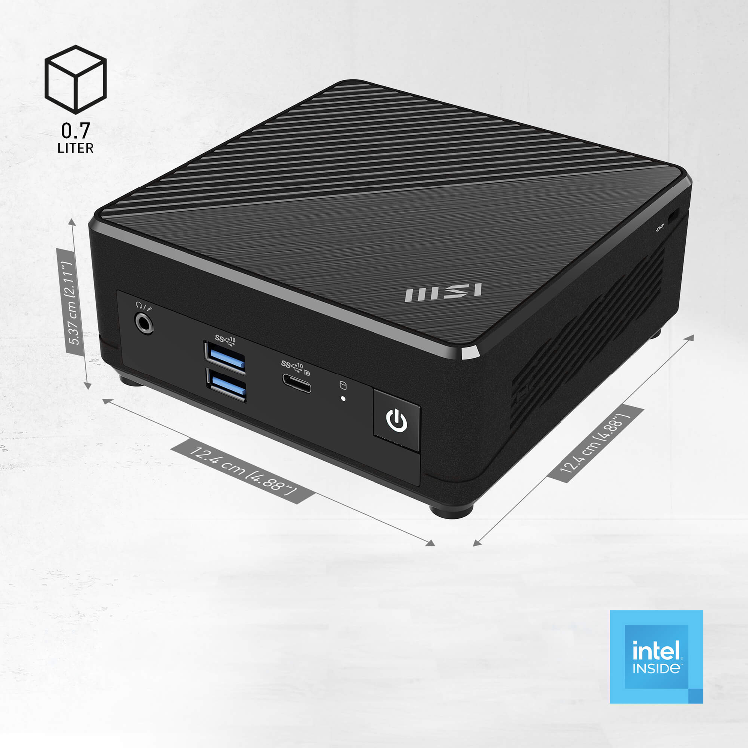 A black MSI mini PC with dimensions labeled. The PC has USB ports, a power button, and an Intel Inside sticker. 0.7 Liter.