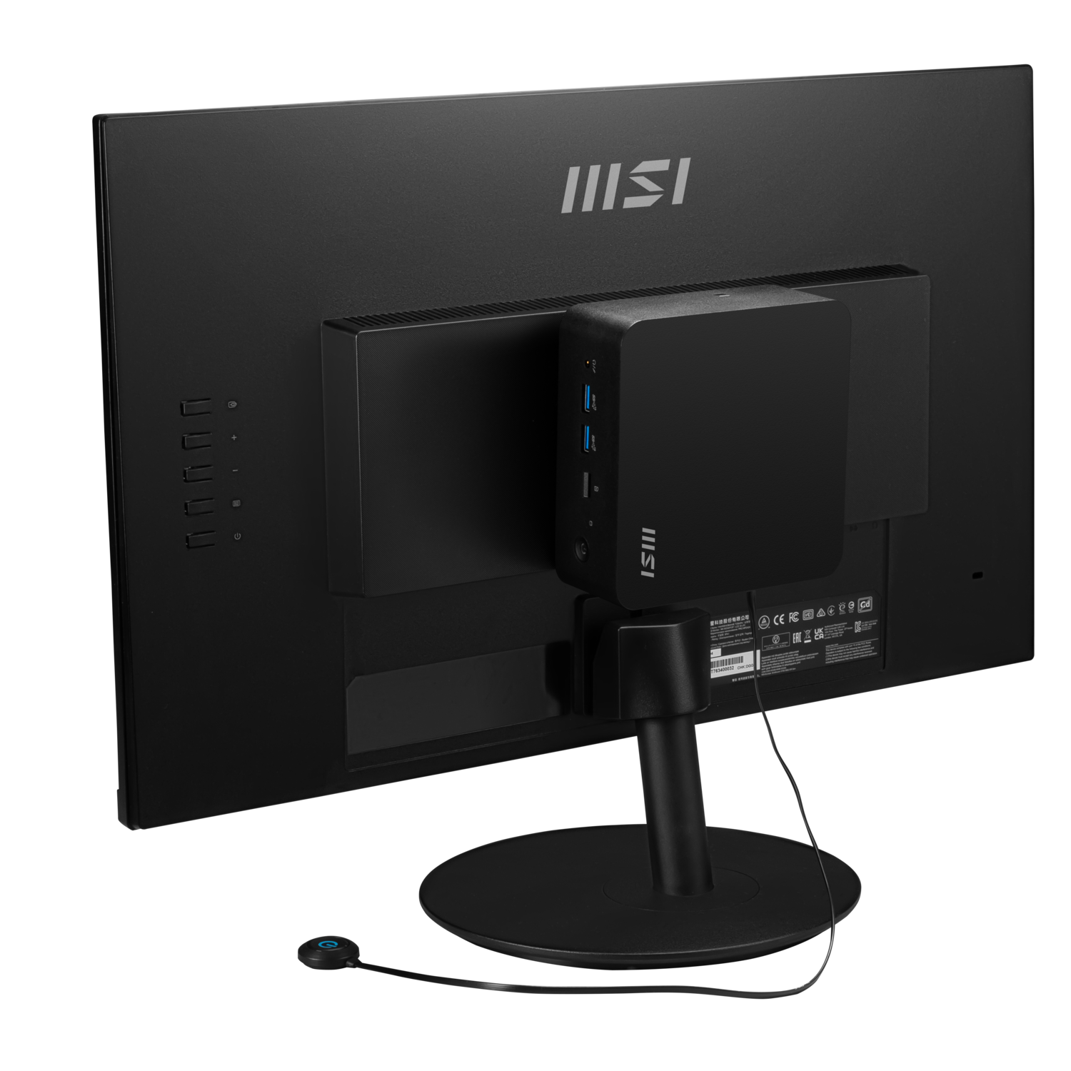A black monitor with a black mini PC attached. A round power button is below the monitor. The MSI logo is visible.