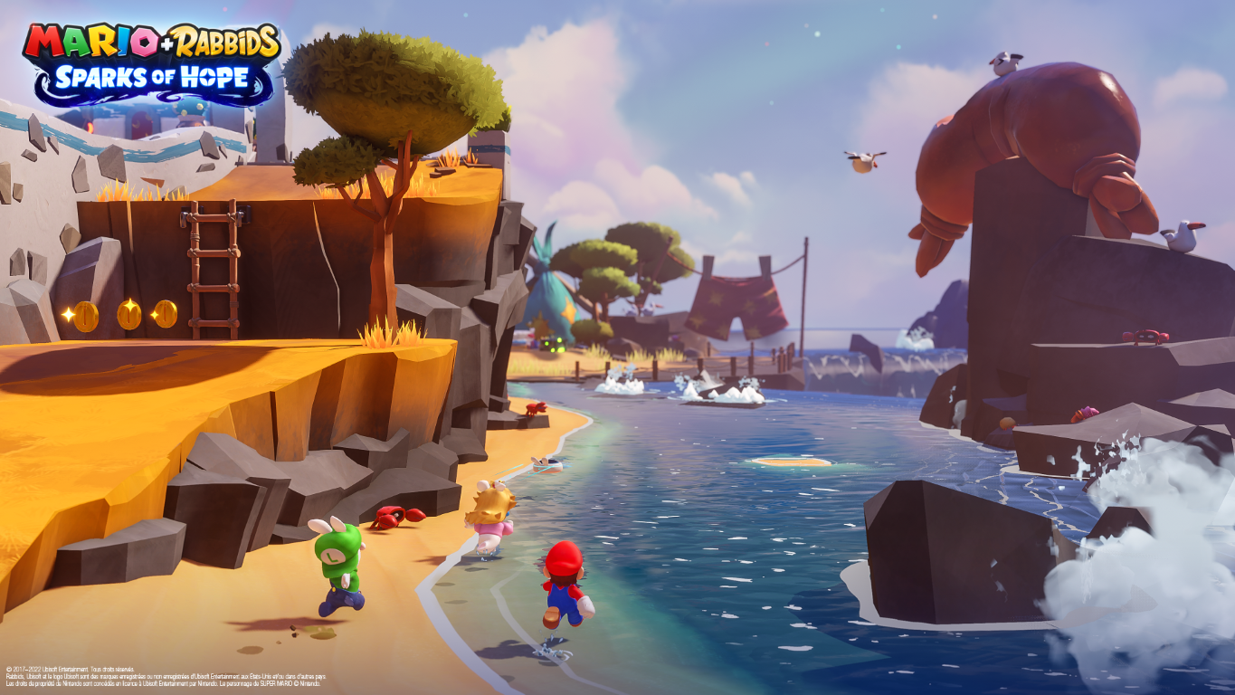 Mario, postacie Rabbid biegną po plaży. W tle woda, skały i wzgórza. Olbrzymie stworzenie na skale.