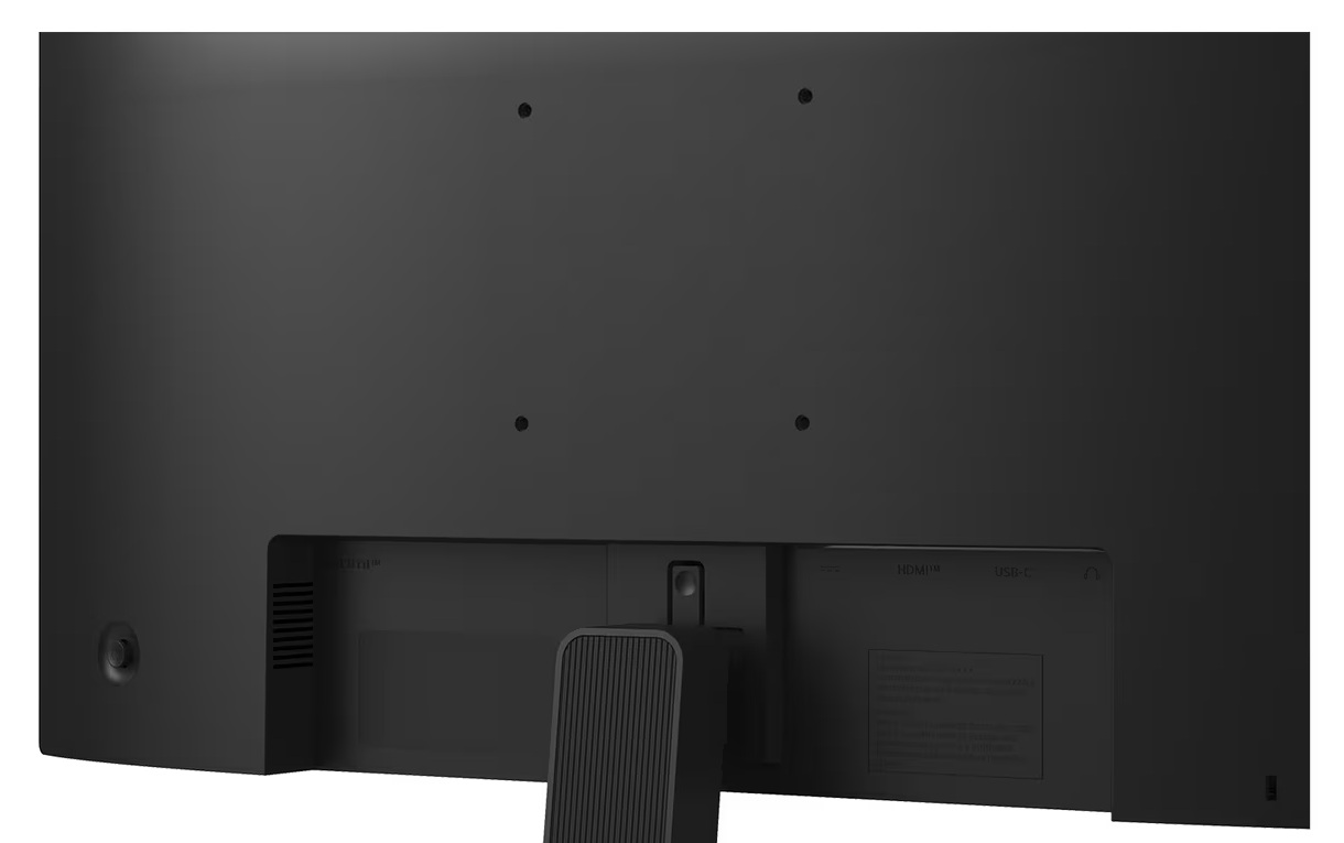 Widok z tyłu czarnego monitora. Posiada porty połączeniowe i podstawkę. Z tyłu znajdują się otwory na śruby.