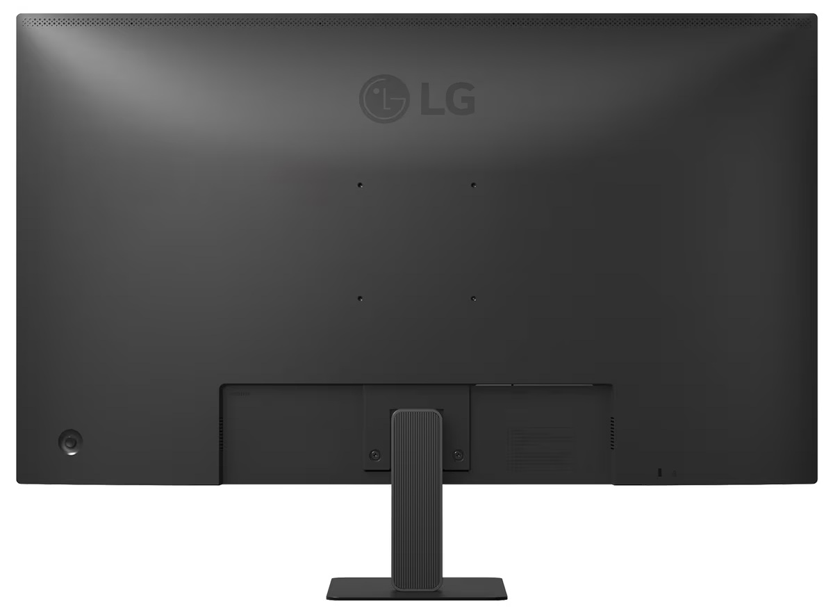 Tył czarnego monitora LG. Ma podstawę, logo LG i różne porty.