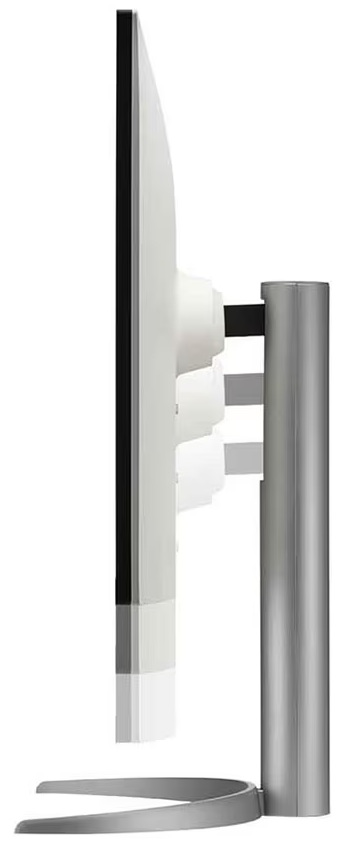 Widok z boku monitora komputera. Ma biały ekran, czarną ramkę i srebrną podstawę.