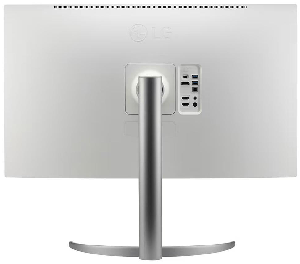 Tył białego monitora LG ze srebrną podstawą. Porty widoczne po prawej stronie. Logo LG na górze. Zakrzywiony ekran.