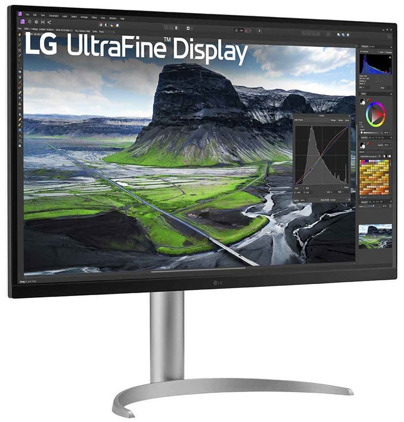 Monitor LG UltraFine Display wyświetlający obraz krajobrazu z zielonymi polami, górą i interfejsem oprogramowania do edycji.