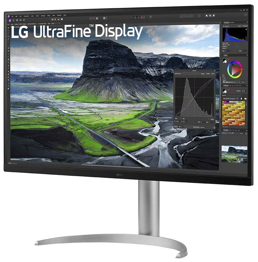 Monitor LG UltraFine Display z krajobrazem z zielonymi polami, górami i interfejsem oprogramowania do edycji.