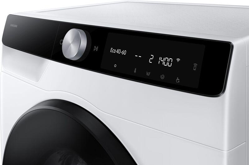 Weiße Waschmaschine, schwarzes Display mit Einstellungen, mit Drehknopf und Tasten. Samsung-Logo sichtbar.