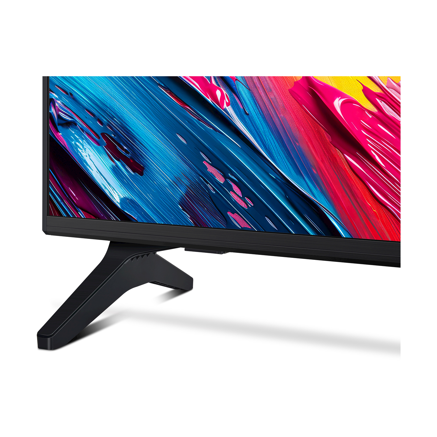 Una TV nera con un display astratto colorato è posizionata su una superficie bianca. La TV ha un supporto ed è angolata verso destra.