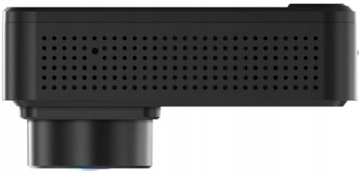 Czarne urządzenie z okrągłymi otworami wentylacyjnymi i cylindrycznym obiektywem. Urządzenie jest na białym tle.