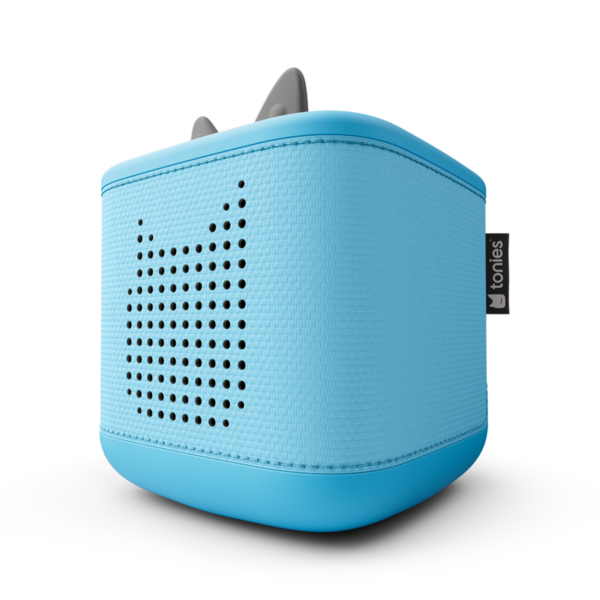 Eine blaue Toniebox, ein würfelförmiger Audioplayer, mit einem katzenförmigen Lautsprechergrill und grauen Ohren.
