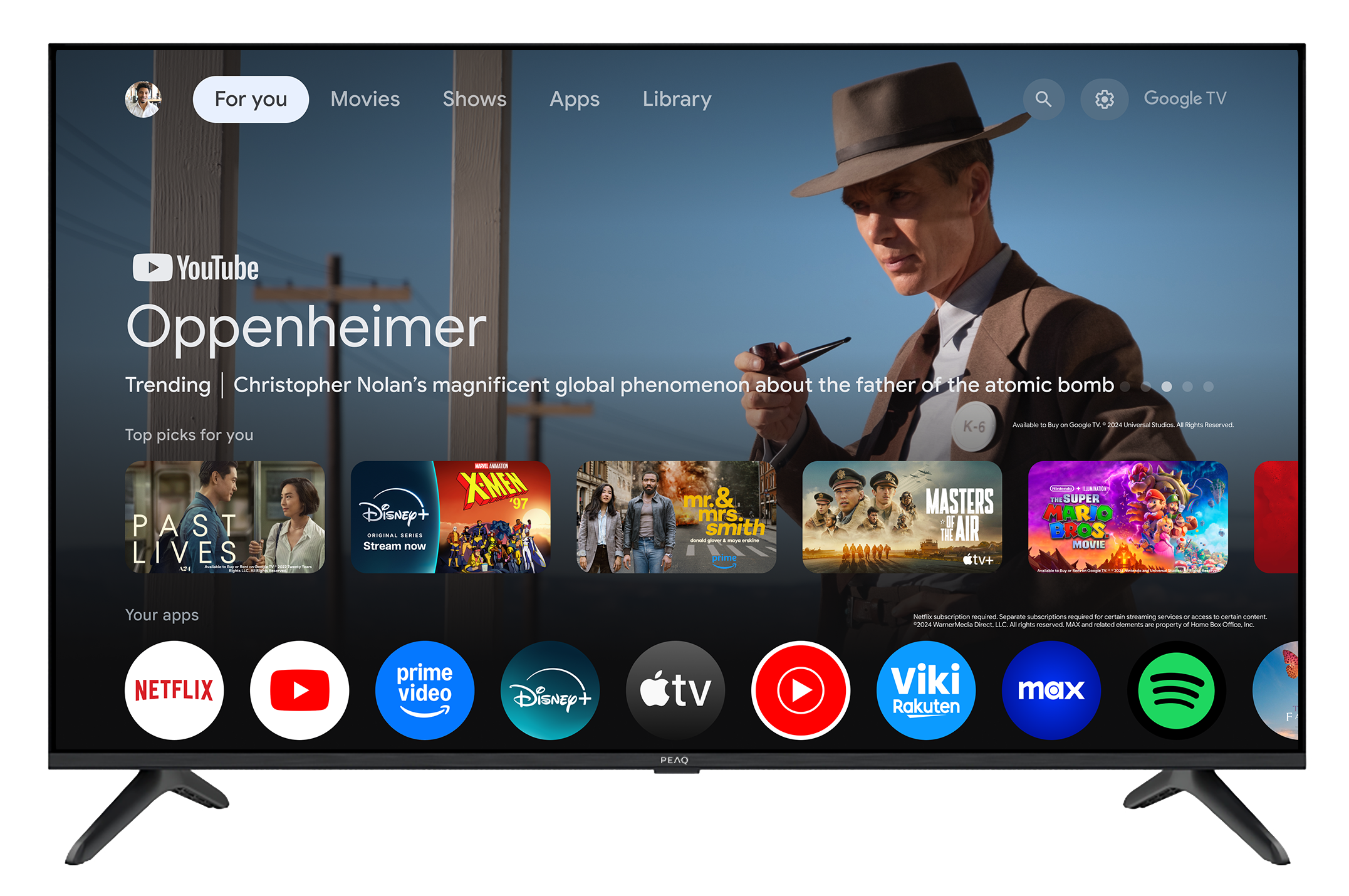 Ekran główny Google TV z Oppenheimerem, filmami i ikonami aplikacji.