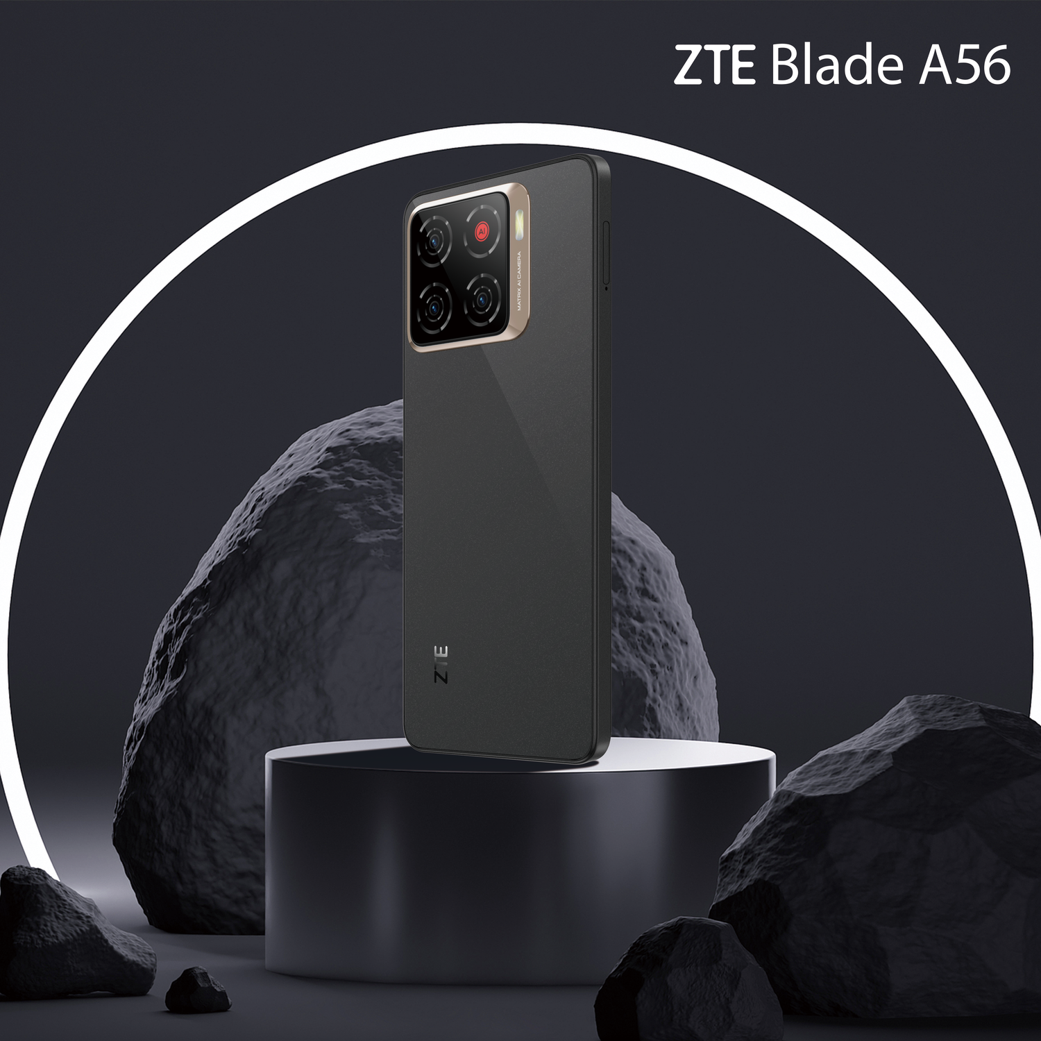 A black ZTE Blade A56 phone stands on a podium. Rocks surround it. A white ring and the phone's name are in the background.