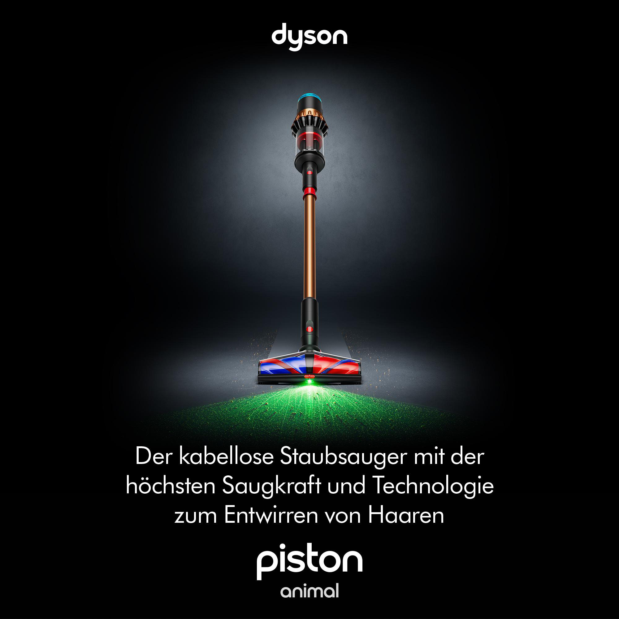 Dyson Akkusauger. Er ist schwarz und braun mit einem roten und blauen Kopf. Grünes Licht scheint vom Kopf.