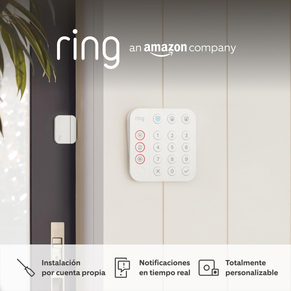 Teclado y sensor Ring blancos en una pared blanca. El teclado tiene números y botones. El logotipo de Ring está en la parte superior.