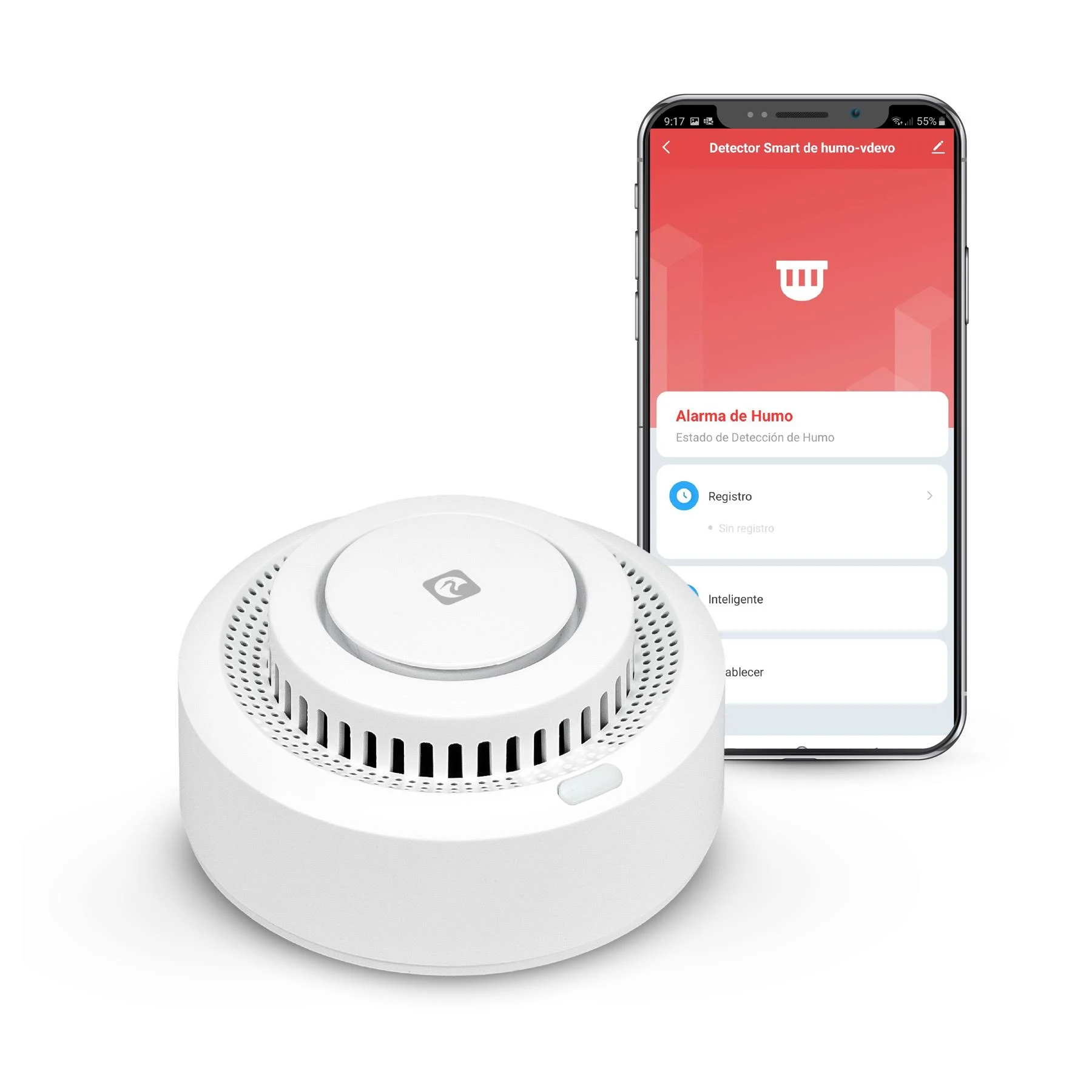 Detector de humo blanco junto a un smartphone que muestra una interfaz de aplicación con fondo rojo y texto en español.